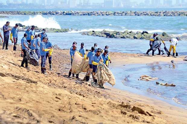 Cleaning beaches in Sri Lanka